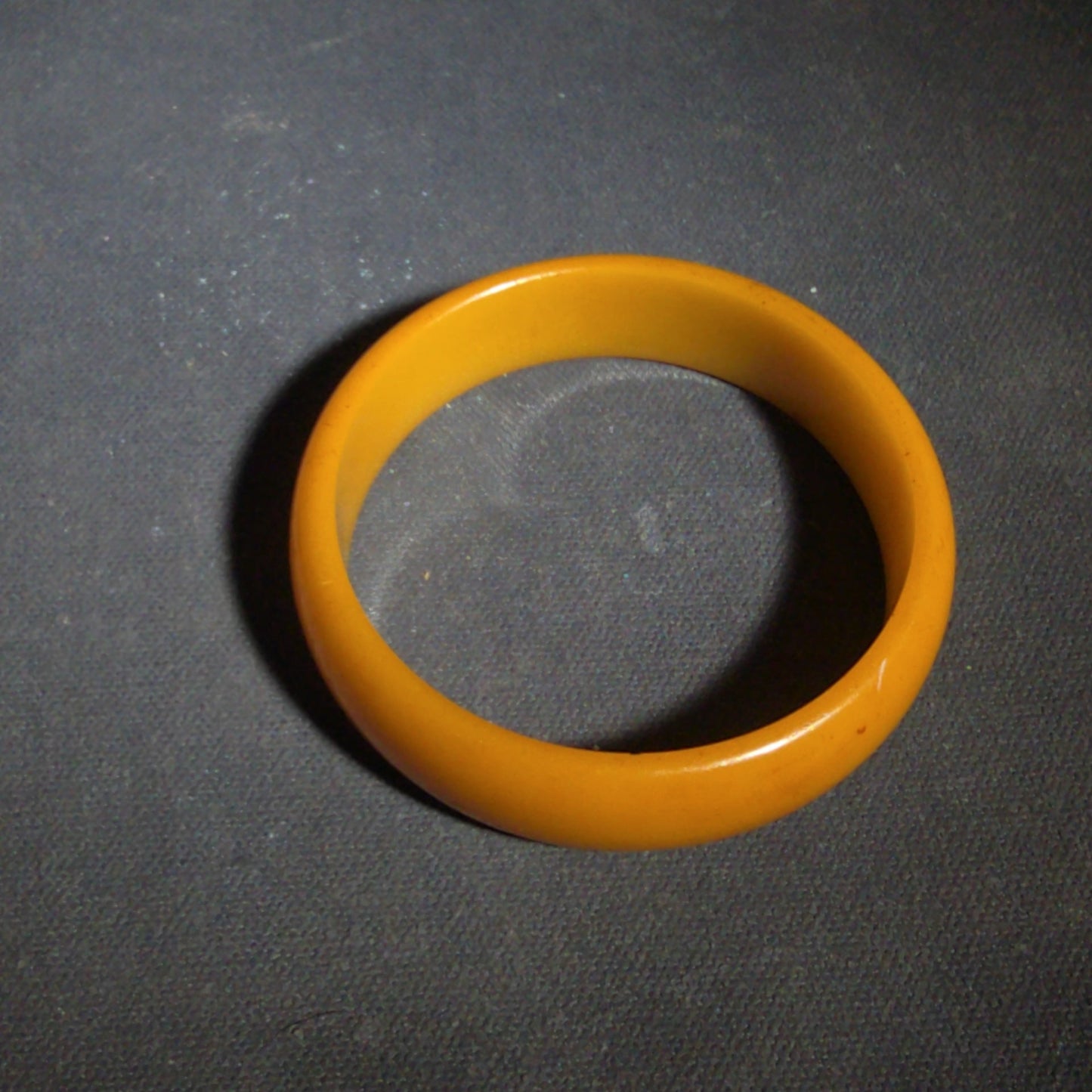 Pair of Antique Butterscotch Early Plastic Bangle Bracelets including Closed Bangle and Open Cuff