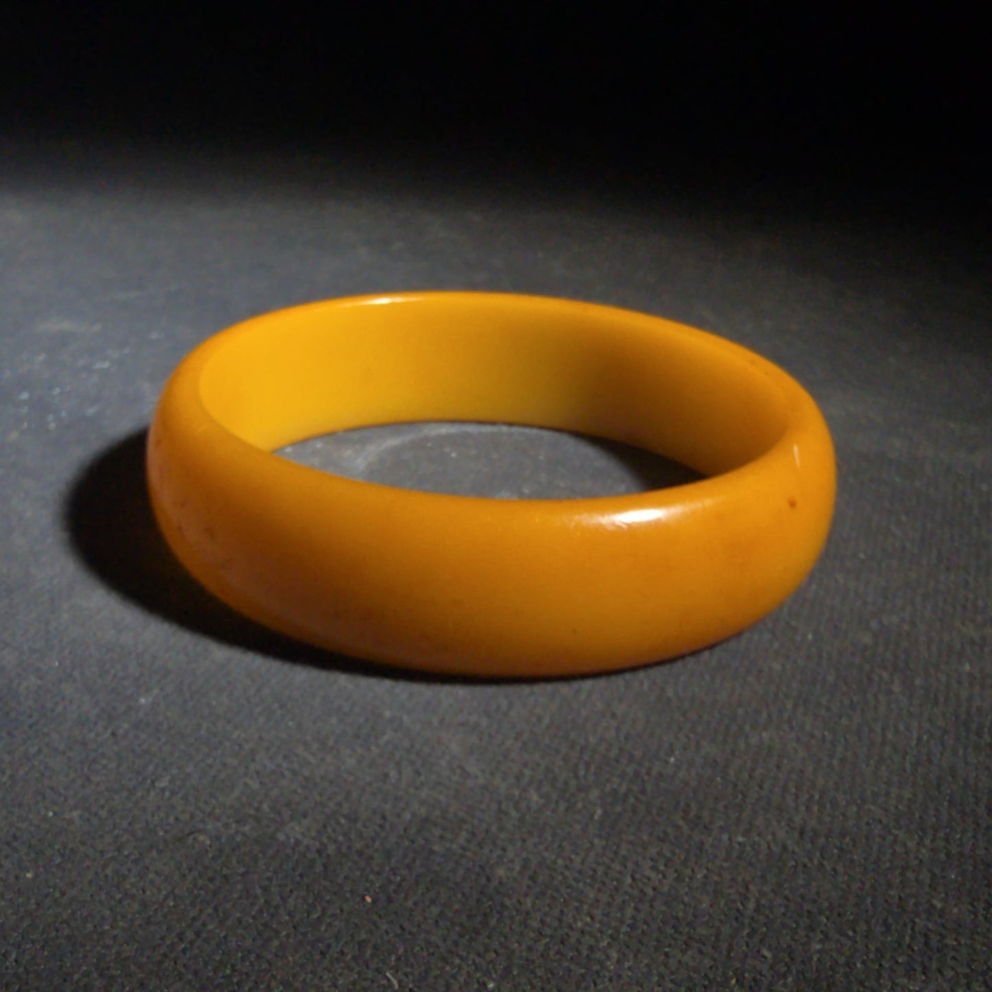 Pair of Antique Butterscotch Early Plastic Bangle Bracelets including Closed Bangle and Open Cuff
