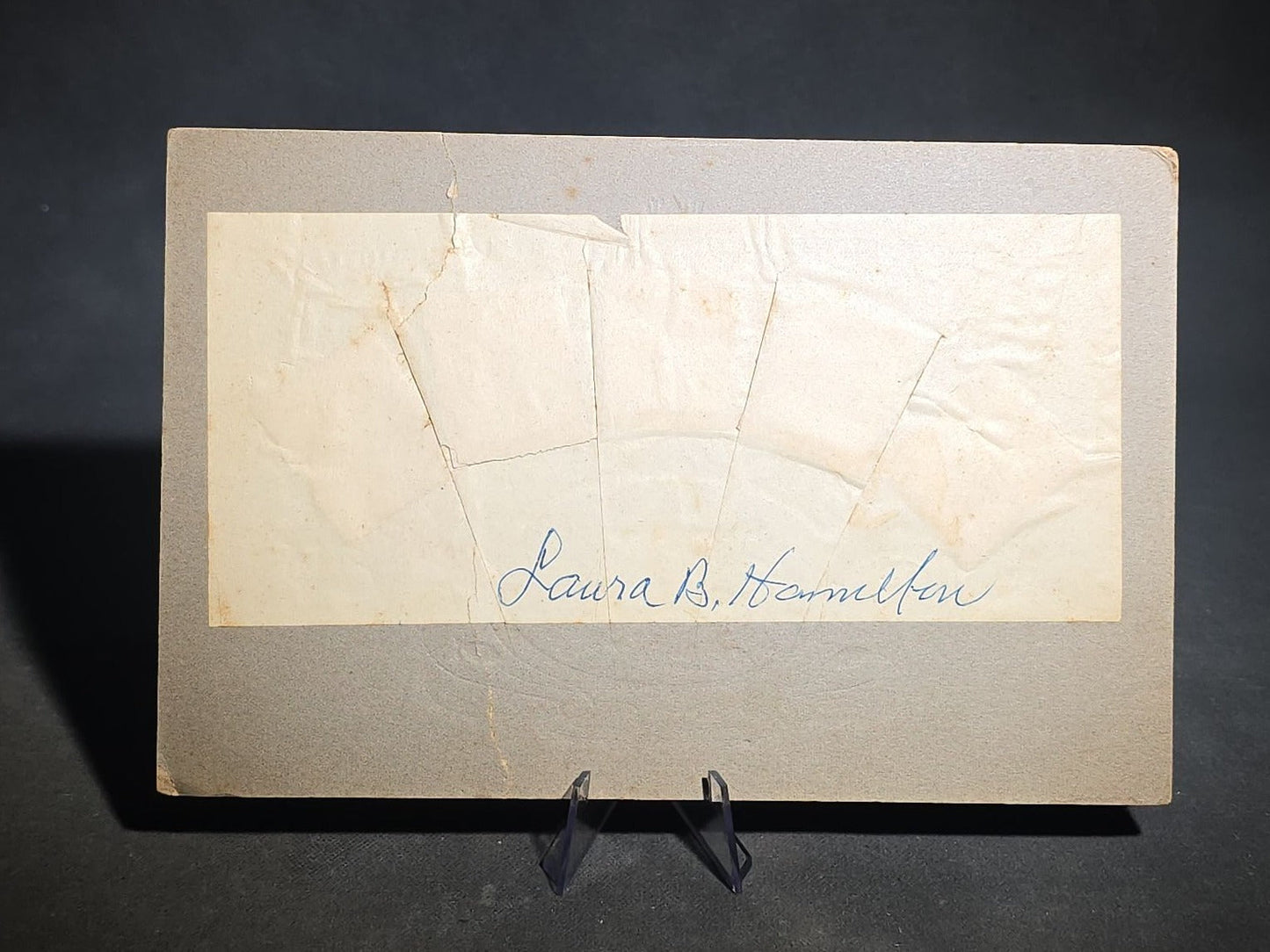 Grouping of Four Antique Photographs and Print including Embossed Photo Display with Five Portraits, Women Playing Combs with Manuscript Poem Verso, Boy in Native American Costume, and Little Red Riding Hood Engraving