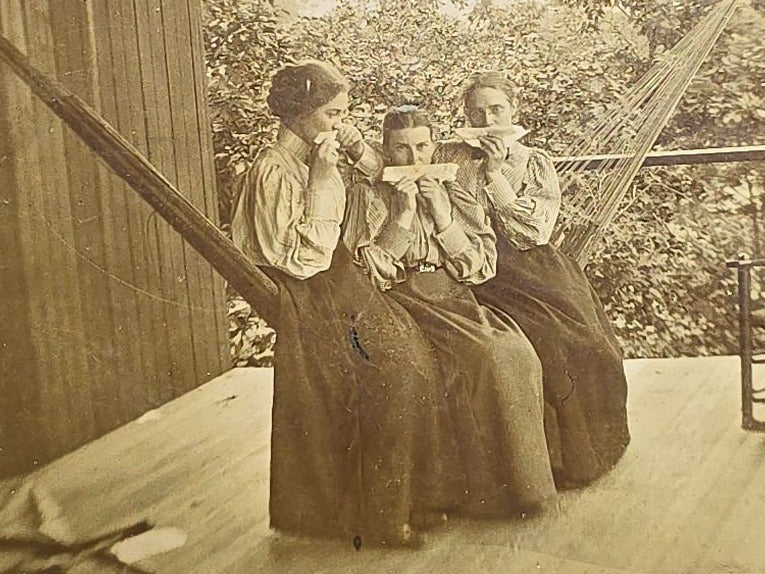 Grouping of Four Antique Photographs and Print including Embossed Photo Display with Five Portraits, Women Playing Combs with Manuscript Poem Verso, Boy in Native American Costume, and Little Red Riding Hood Engraving