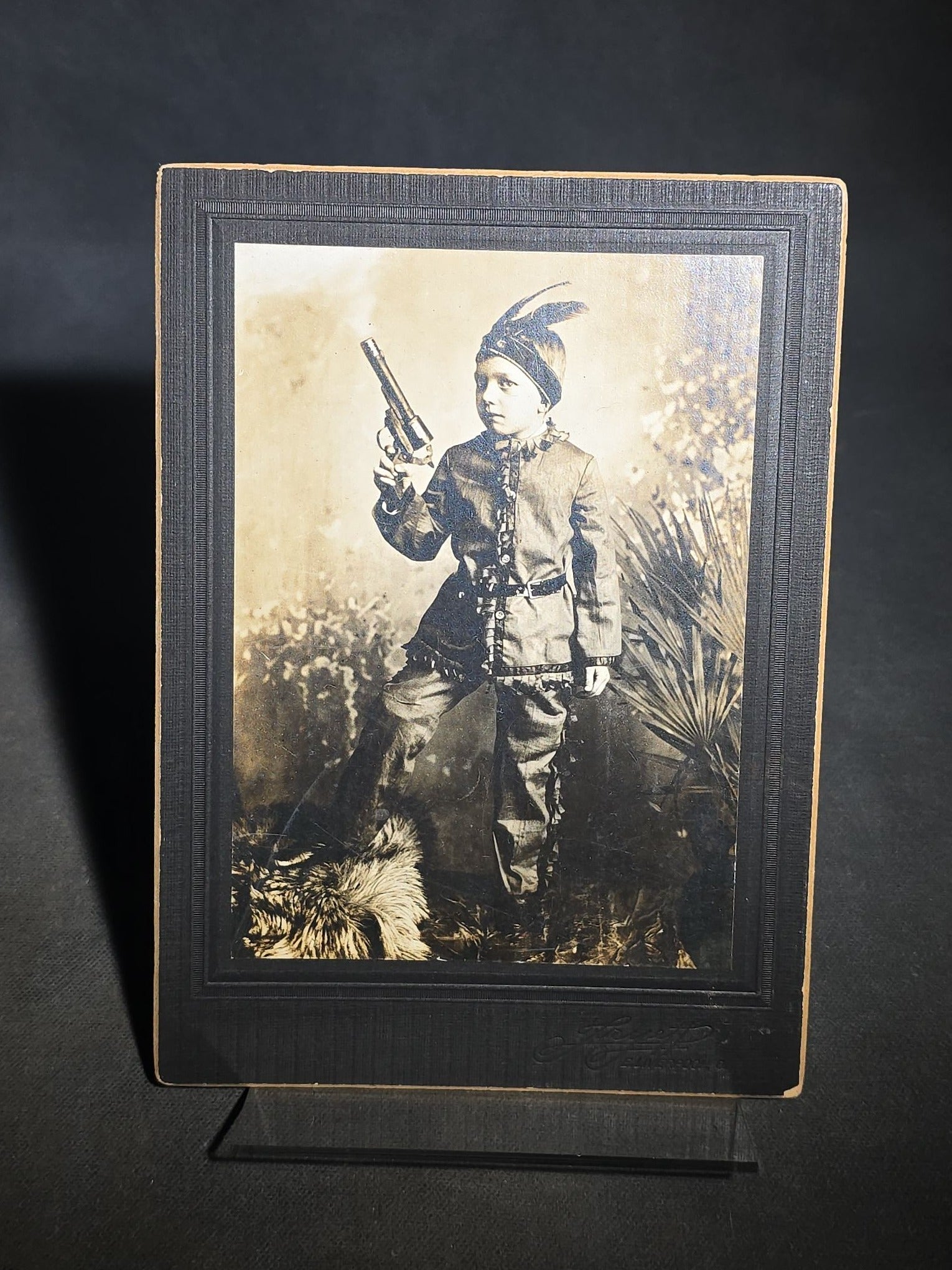 Grouping of Four Antique Photographs and Print including Embossed Photo Display with Five Portraits, Women Playing Combs with Manuscript Poem Verso, Boy in Native American Costume, and Little Red Riding Hood Engraving