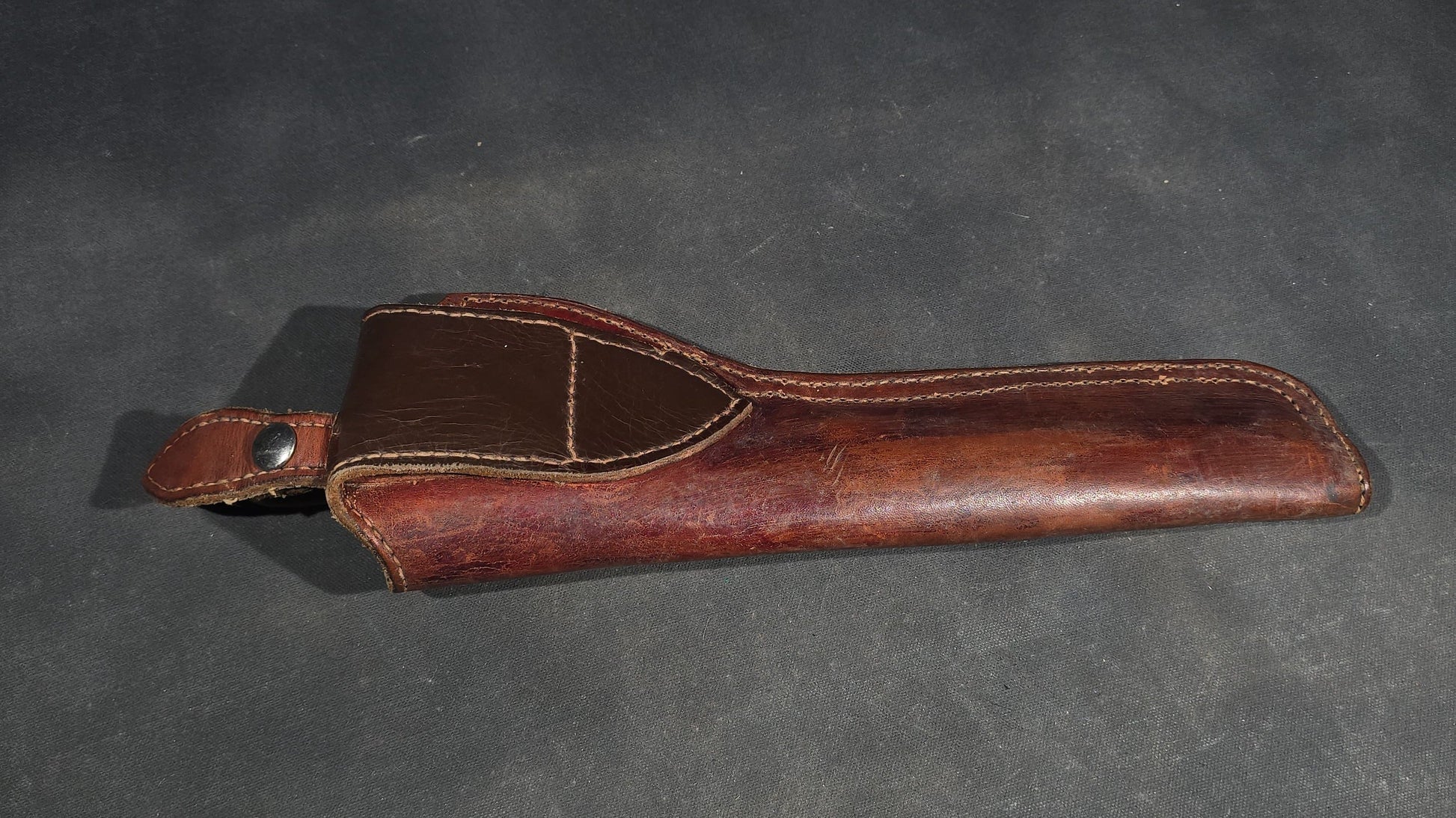 Grouping of Seven Vintage Leather Pistol Holsters including Bianchi #111 Cyclone and Interarms PHL-1