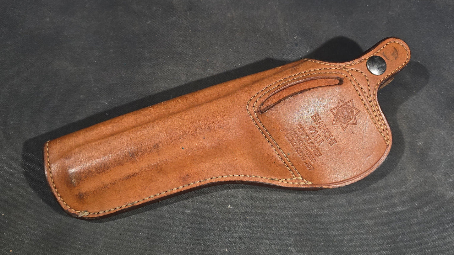 Grouping of Seven Vintage Leather Pistol Holsters including Bianchi #111 Cyclone and Interarms PHL-1