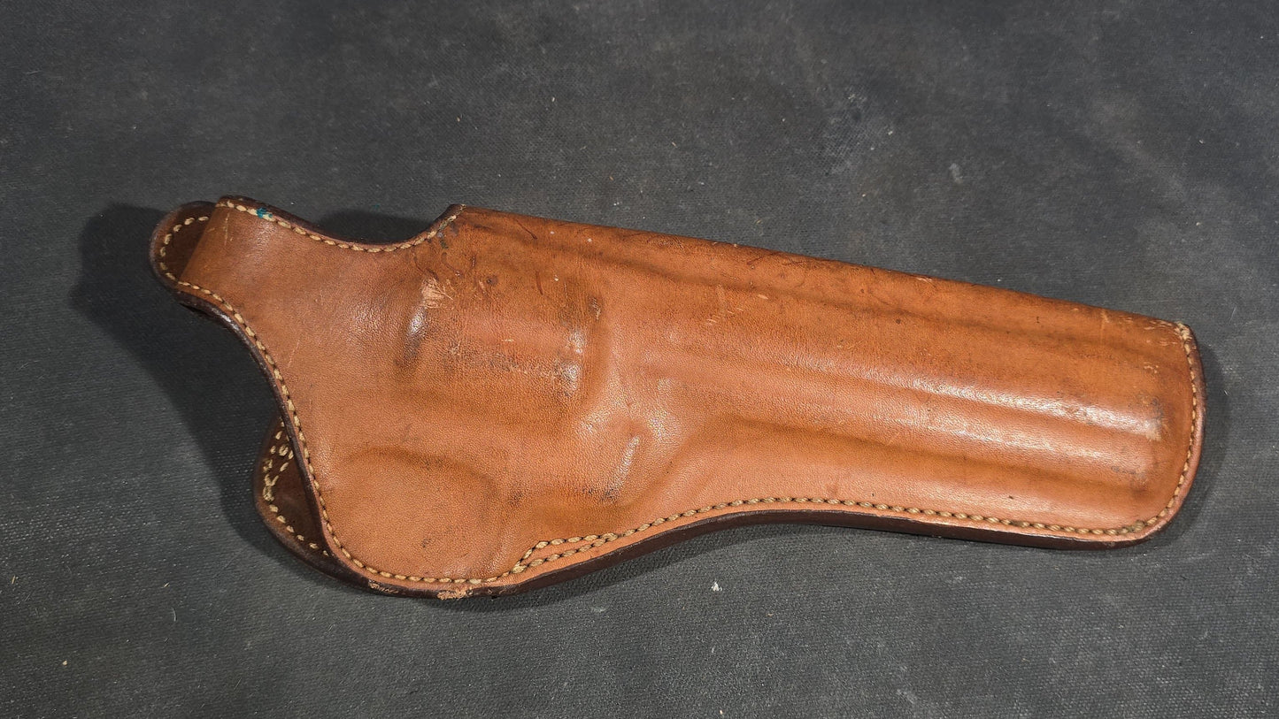 Grouping of Seven Vintage Leather Pistol Holsters including Bianchi #111 Cyclone and Interarms PHL-1