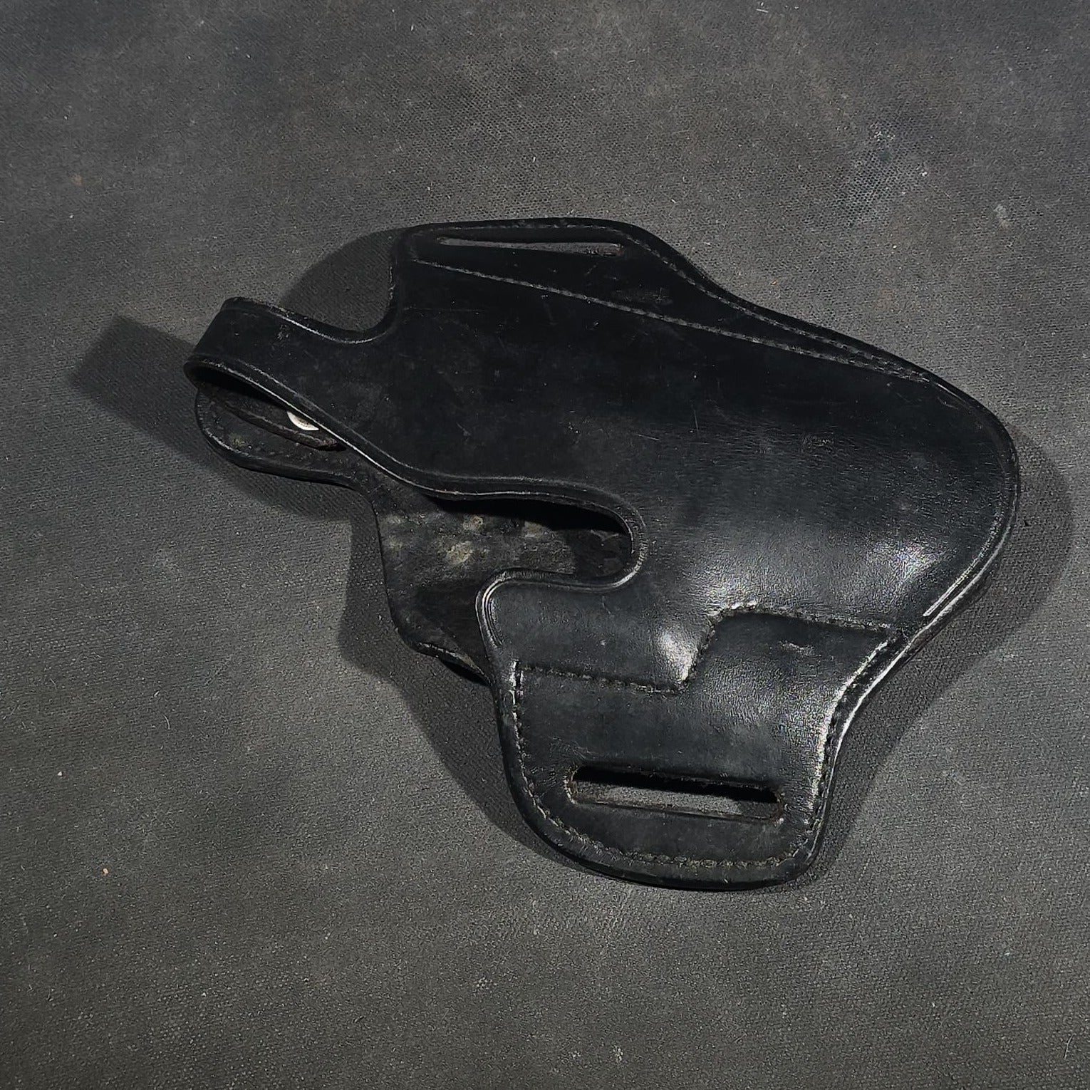 Grouping of Seven Vintage Leather Pistol Holsters including Bianchi #111 Cyclone and Interarms PHL-1