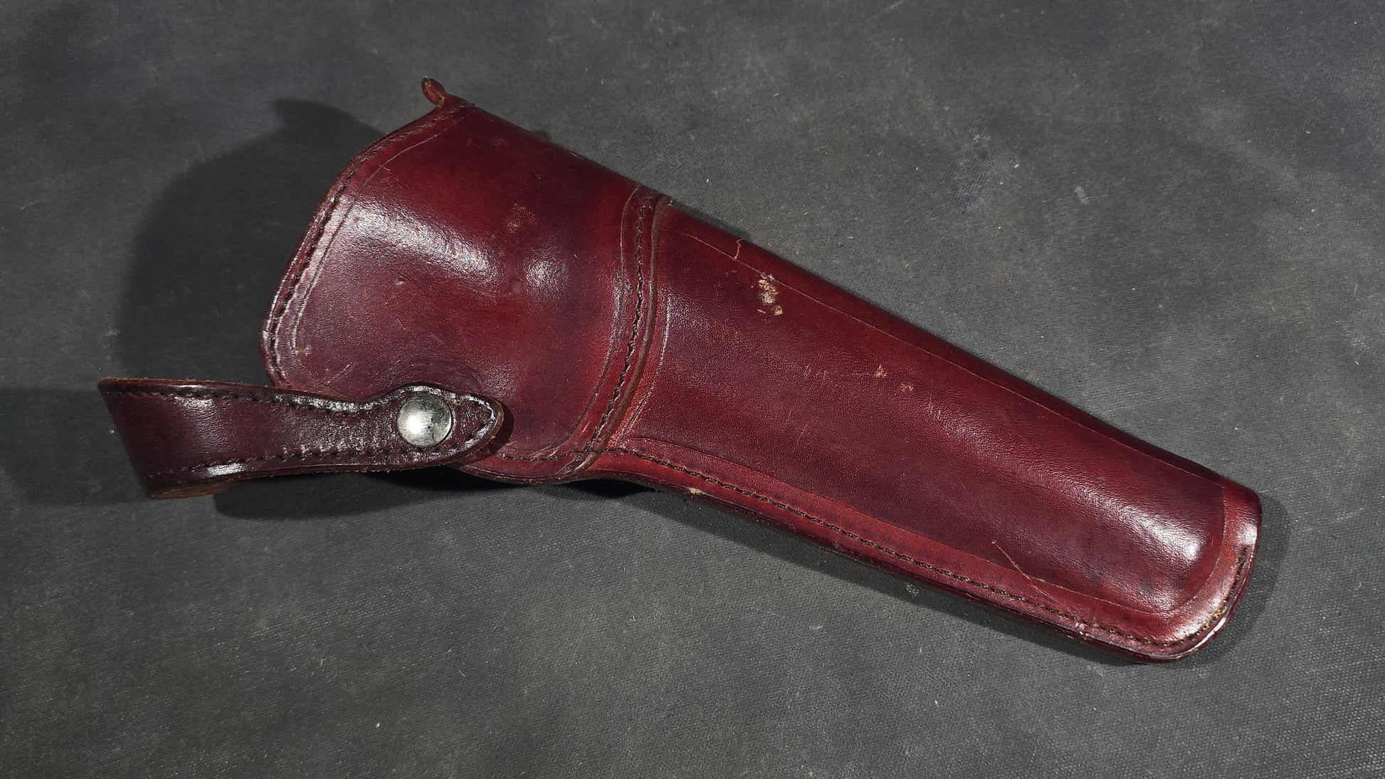 Grouping of Seven Vintage Leather Pistol Holsters including Bianchi #111 Cyclone and Interarms PHL-1