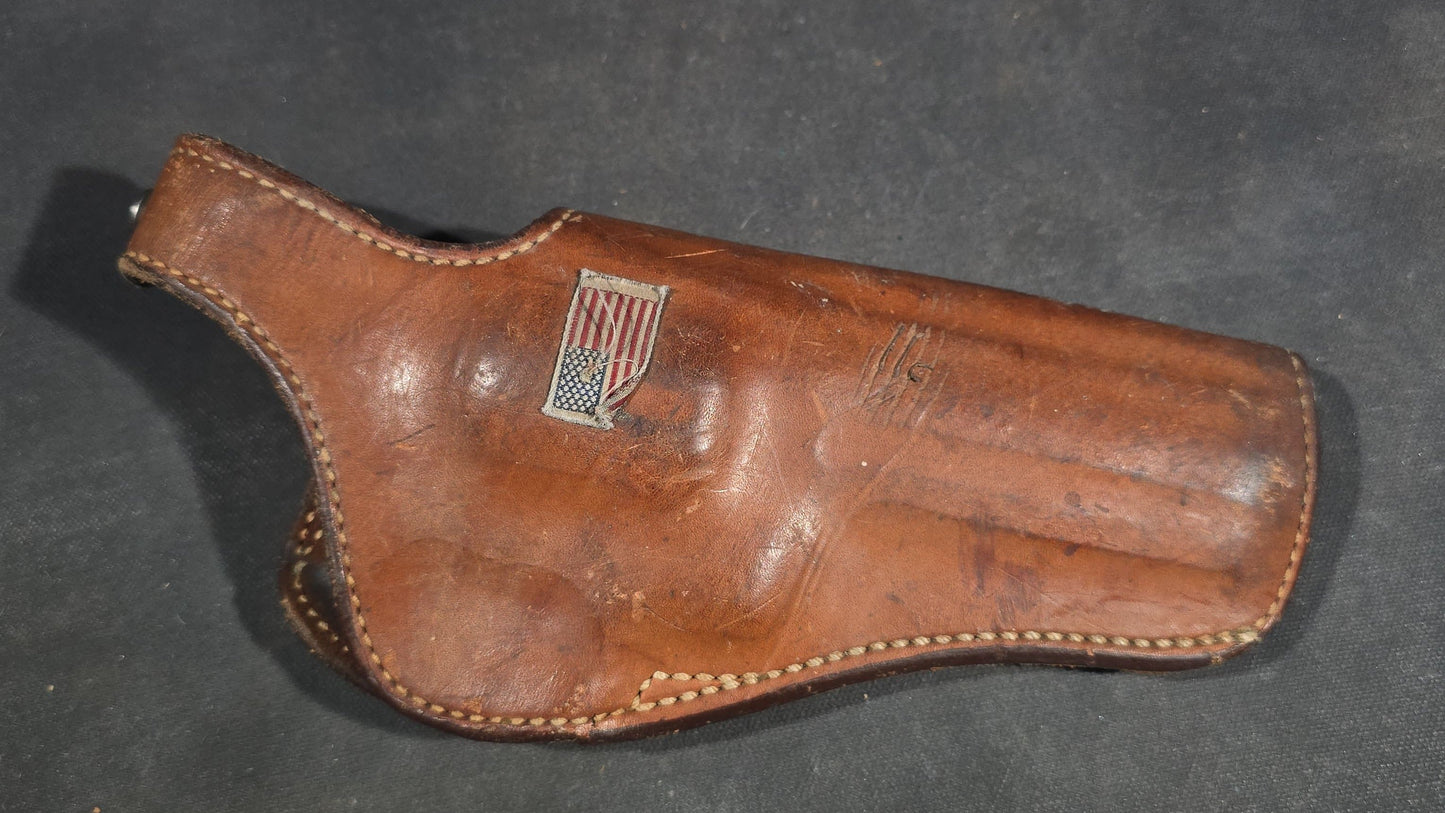 Grouping of Seven Vintage Leather Pistol Holsters including Bianchi #111 Cyclone and Interarms PHL-1