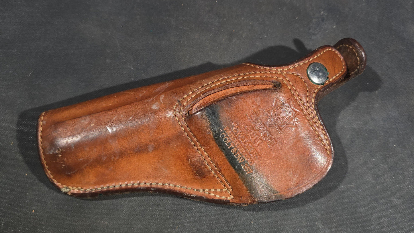 Grouping of Seven Vintage Leather Pistol Holsters including Bianchi #111 Cyclone and Interarms PHL-1