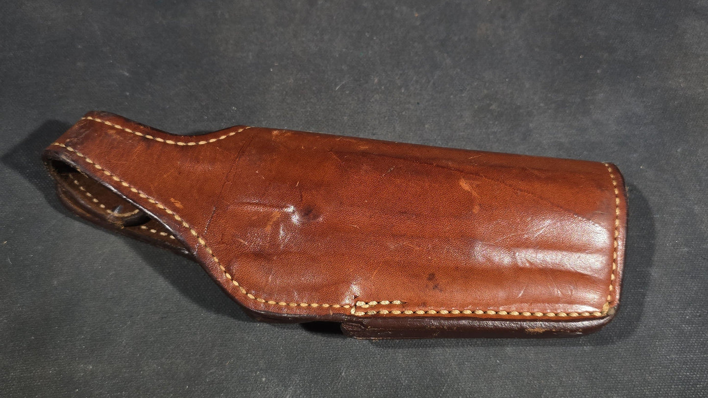 Grouping of Seven Vintage Leather Pistol Holsters including Bianchi #111 Cyclone and Interarms PHL-1
