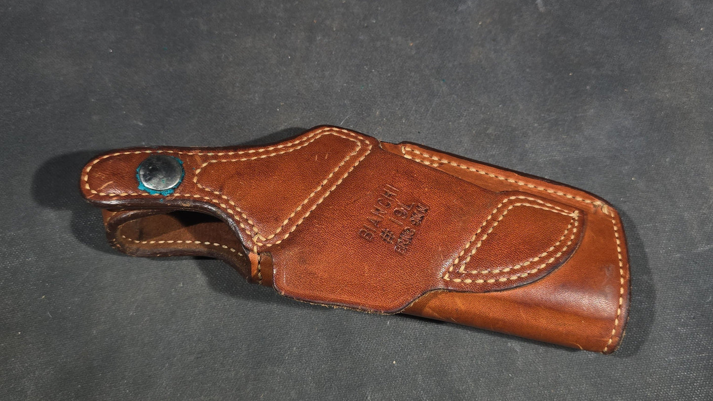 Grouping of Seven Vintage Leather Pistol Holsters including Bianchi #111 Cyclone and Interarms PHL-1