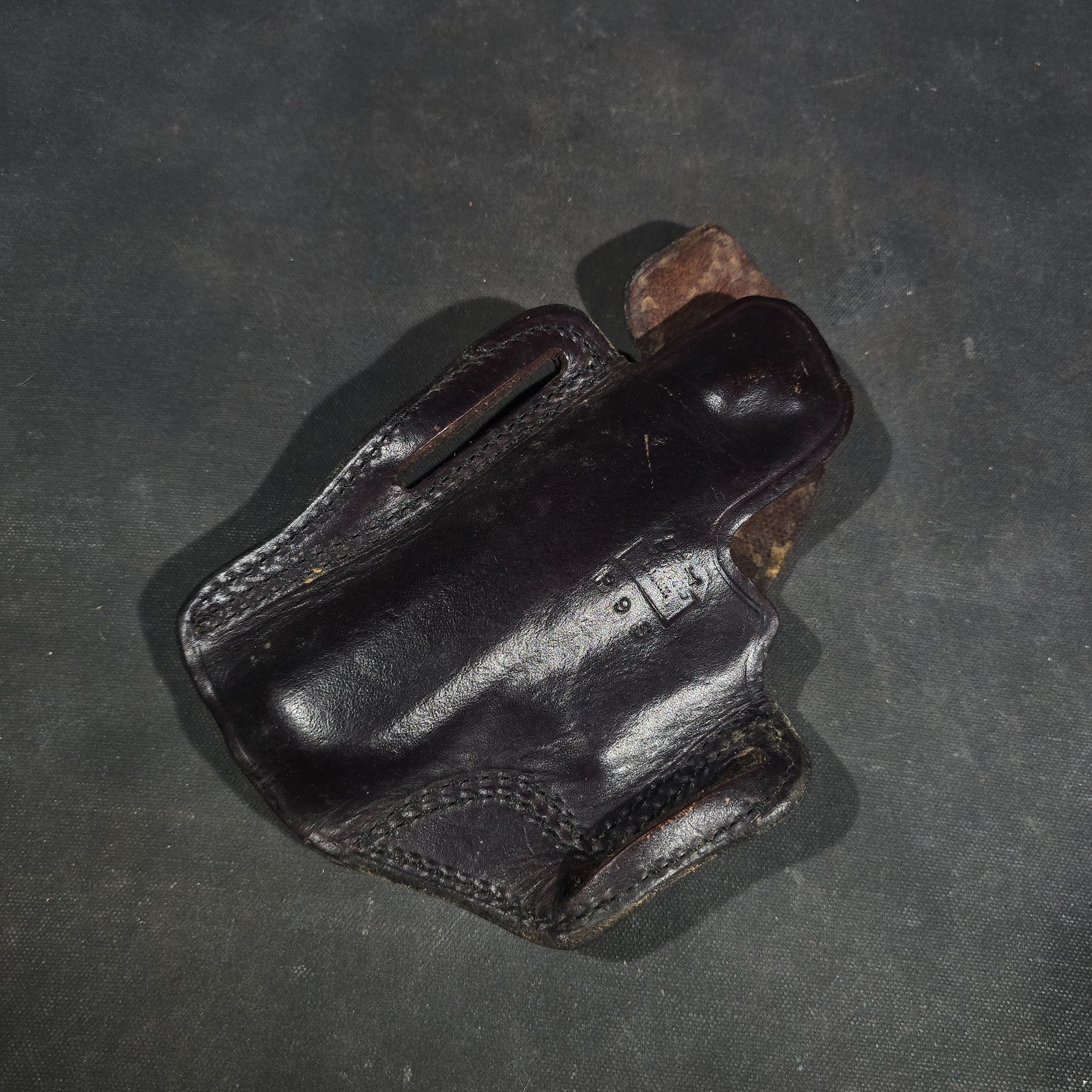 Grouping of Seven Vintage Leather Pistol Holsters including Bianchi #111 Cyclone and Interarms PHL-1