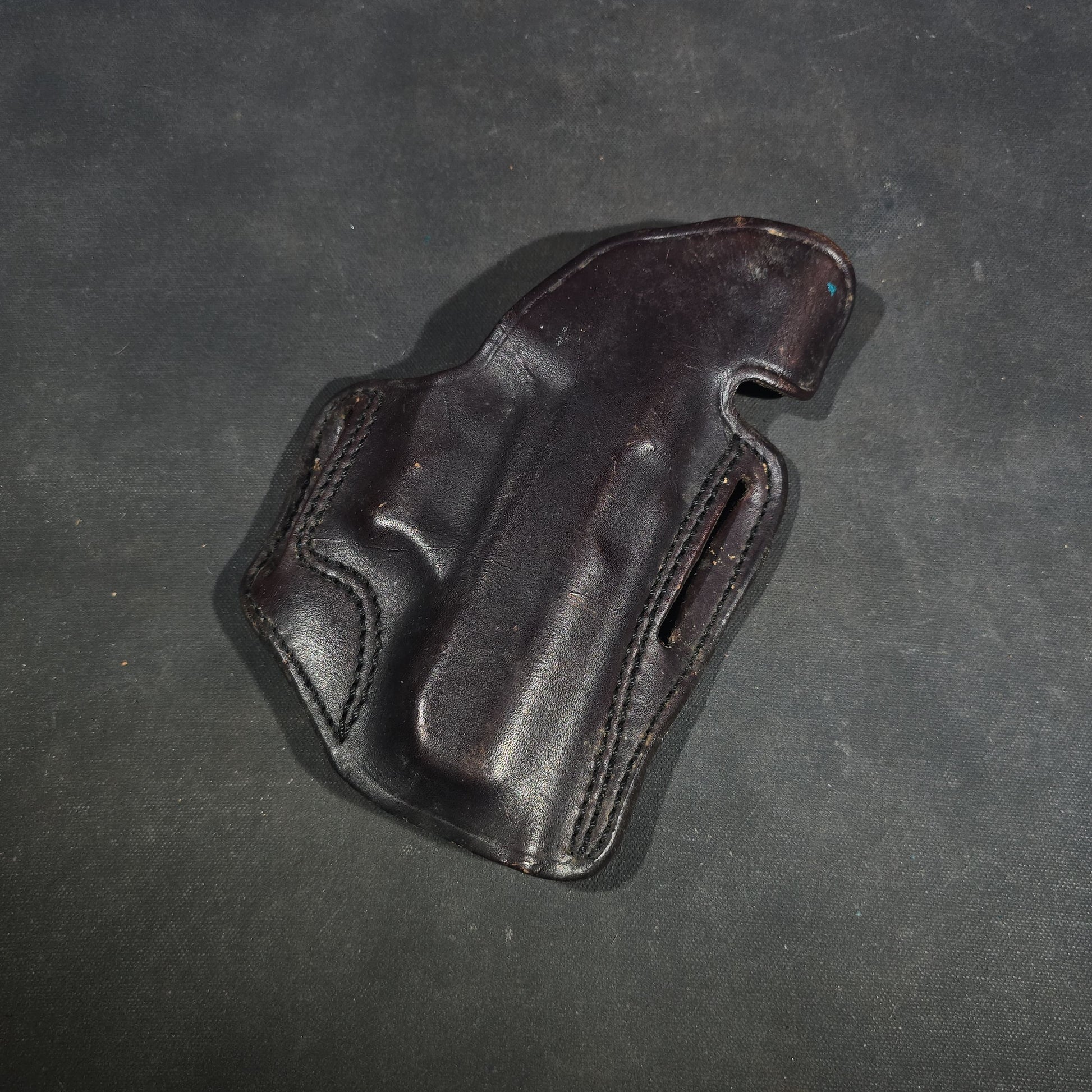 Grouping of Seven Vintage Leather Pistol Holsters including Bianchi #111 Cyclone and Interarms PHL-1