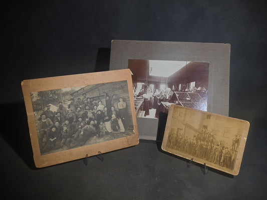 Trio of Antique Board-Mounted Occupational Photographs including Print Shop Interior with Type Cases, Lumber Camp Group at Log Building, and Workers Posed at Clapboard Mill Building