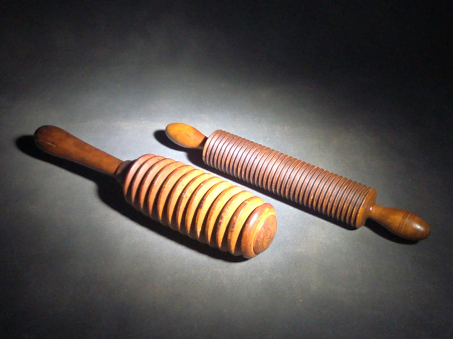 Pair of Antique Turned Wooden Kitchen Utensils including a Ridged Rolling Pasta Pin and a Ridged Single-Handle Masher or Butter Worker