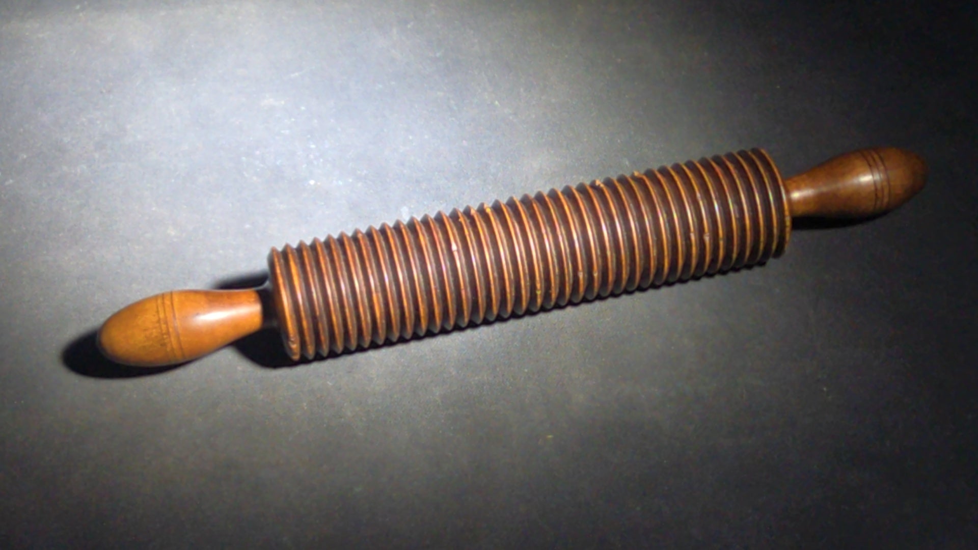 Pair of Antique Turned Wooden Kitchen Utensils including a Ridged Rolling Pasta Pin and a Ridged Single-Handle Masher or Butter Worker