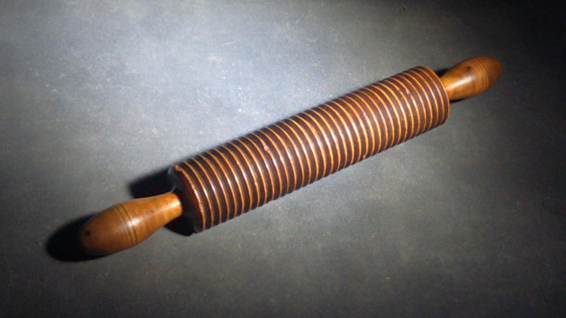 Pair of Antique Turned Wooden Kitchen Utensils including a Ridged Rolling Pasta Pin and a Ridged Single-Handle Masher or Butter Worker