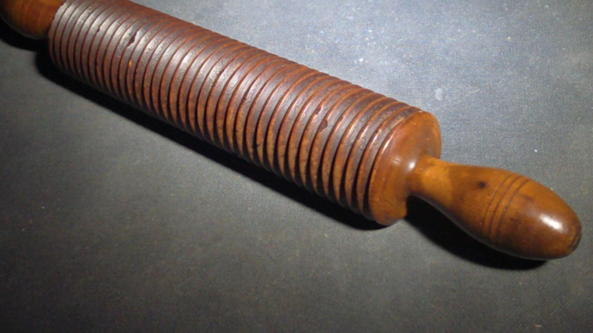 Pair of Antique Turned Wooden Kitchen Utensils including a Ridged Rolling Pasta Pin and a Ridged Single-Handle Masher or Butter Worker