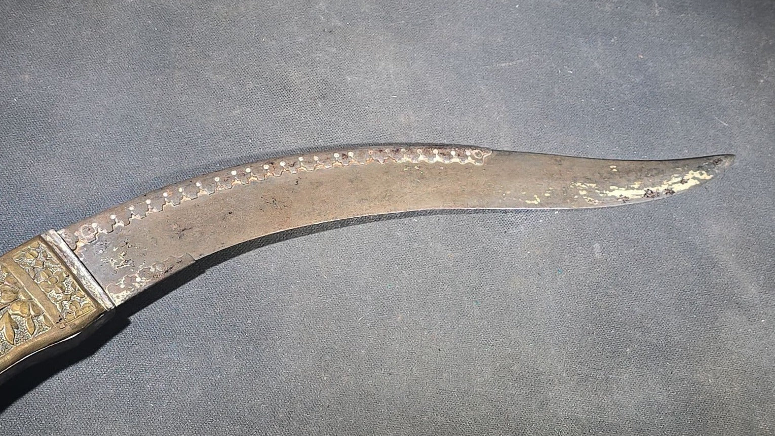 Antique Middle Eastern Curved Dagger with Floral-Decorated Handle