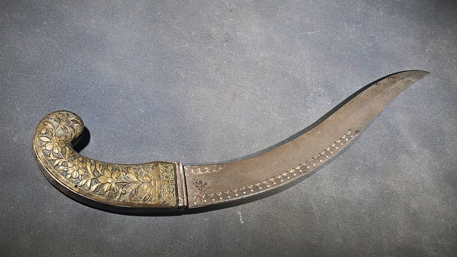 Antique Middle Eastern Curved Dagger with Floral-Decorated Handle