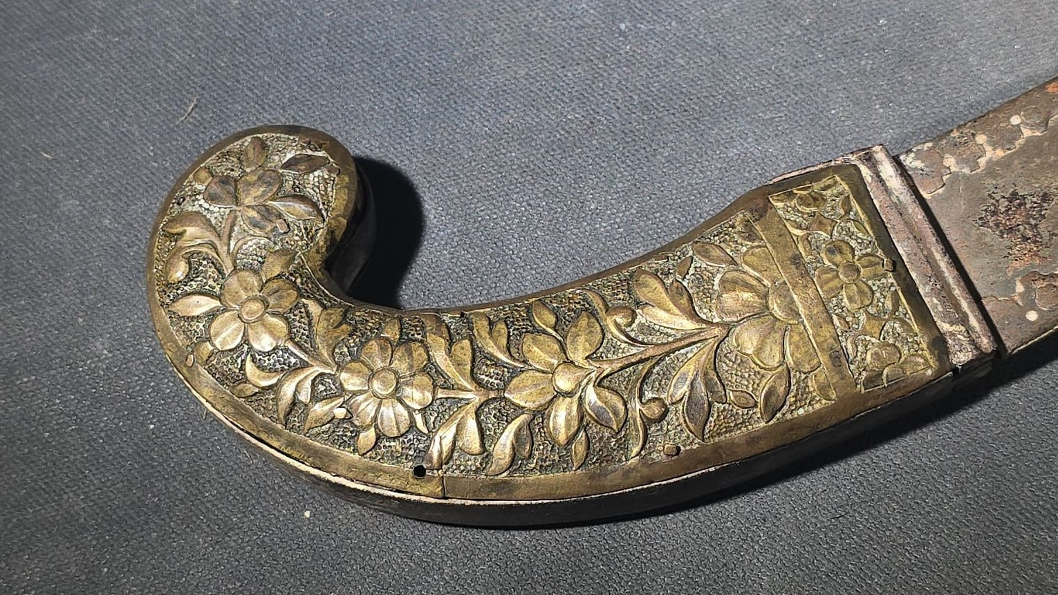 Antique Middle Eastern Curved Dagger with Floral-Decorated Handle