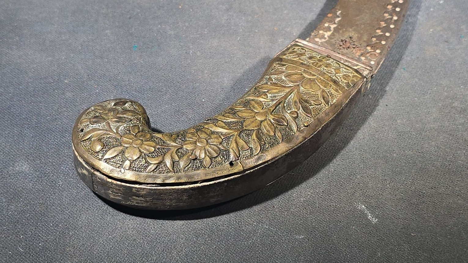 Antique Middle Eastern Curved Dagger with Floral-Decorated Handle