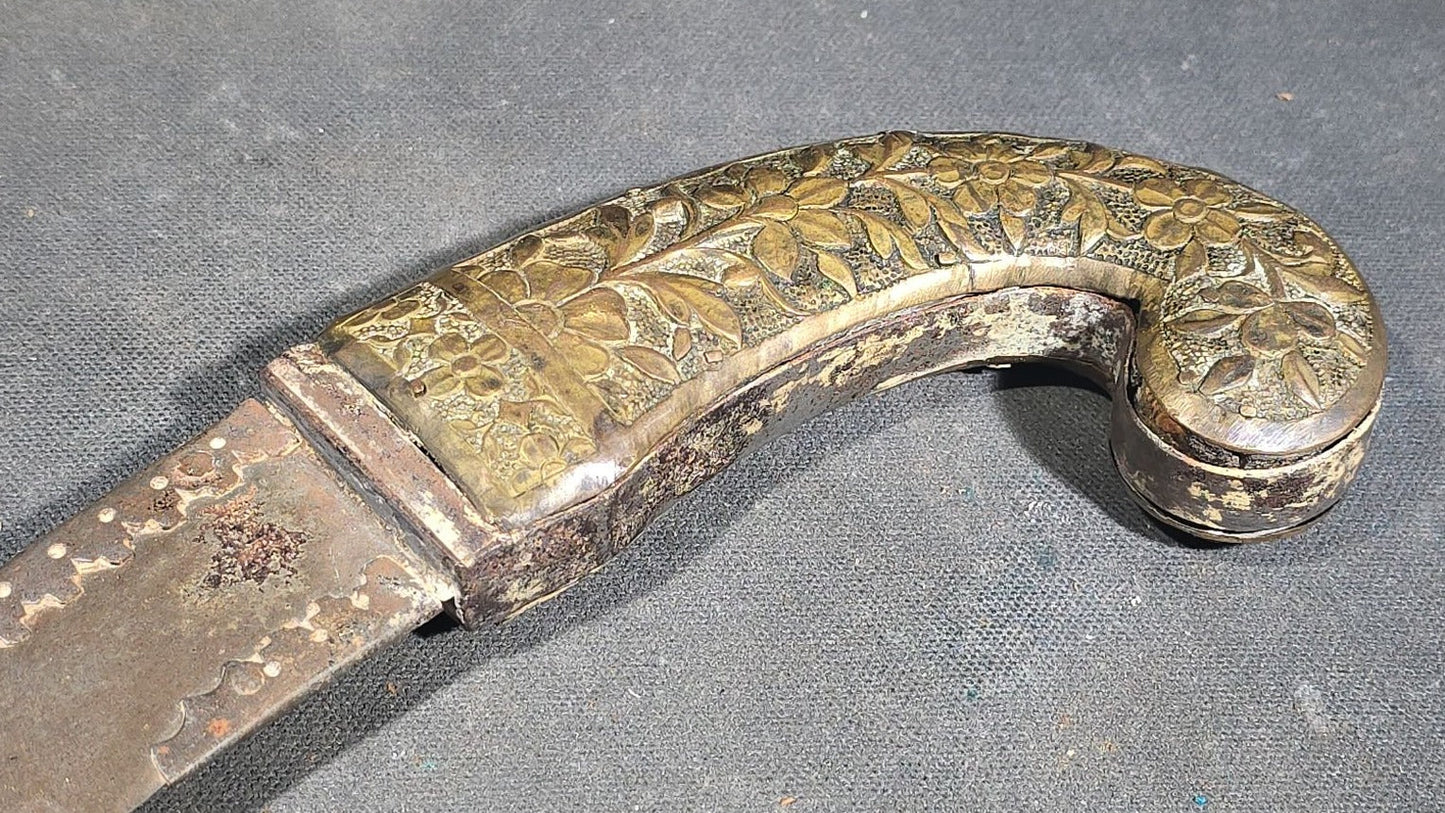 Antique Middle Eastern Curved Dagger with Floral-Decorated Handle
