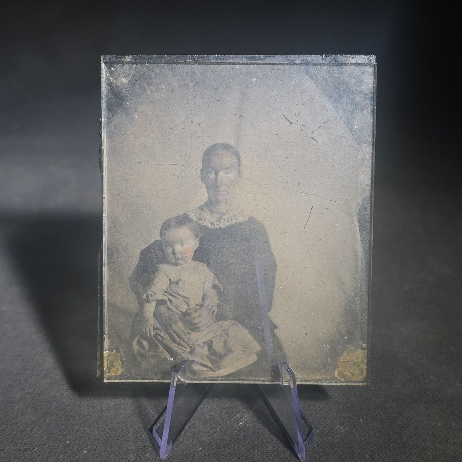 Trio of Antique 1/6th Plate Photographs and Case including Uncased Daguerreotype Photograph of a Seated Woman, Uncased Ambrotype Photograph of a Woman and Child, and Papier-Mache Case with Mother-of-Pearl Inlay