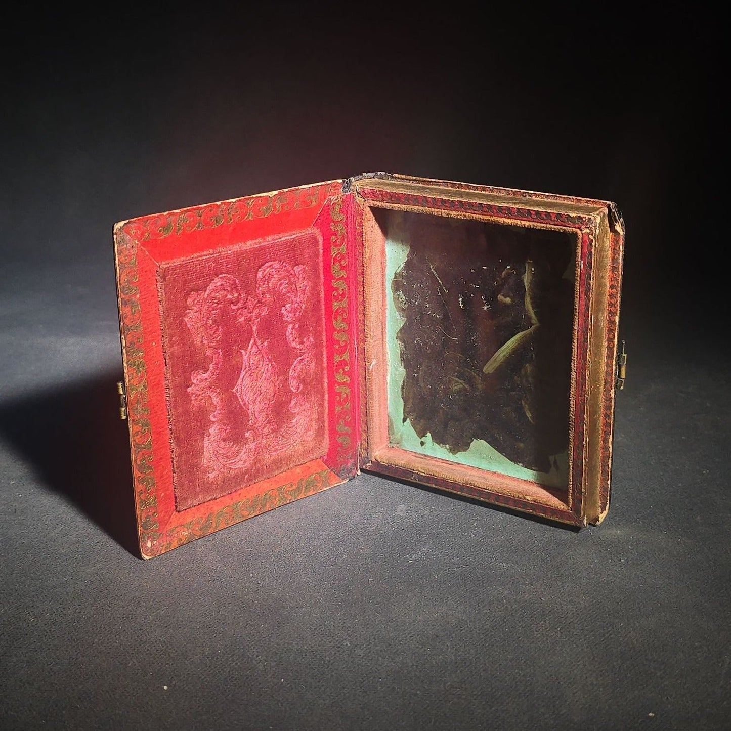 Trio of Antique 1/6th Plate Photographs and Case including Uncased Daguerreotype Photograph of a Seated Woman, Uncased Ambrotype Photograph of a Woman and Child, and Papier-Mache Case with Mother-of-Pearl Inlay