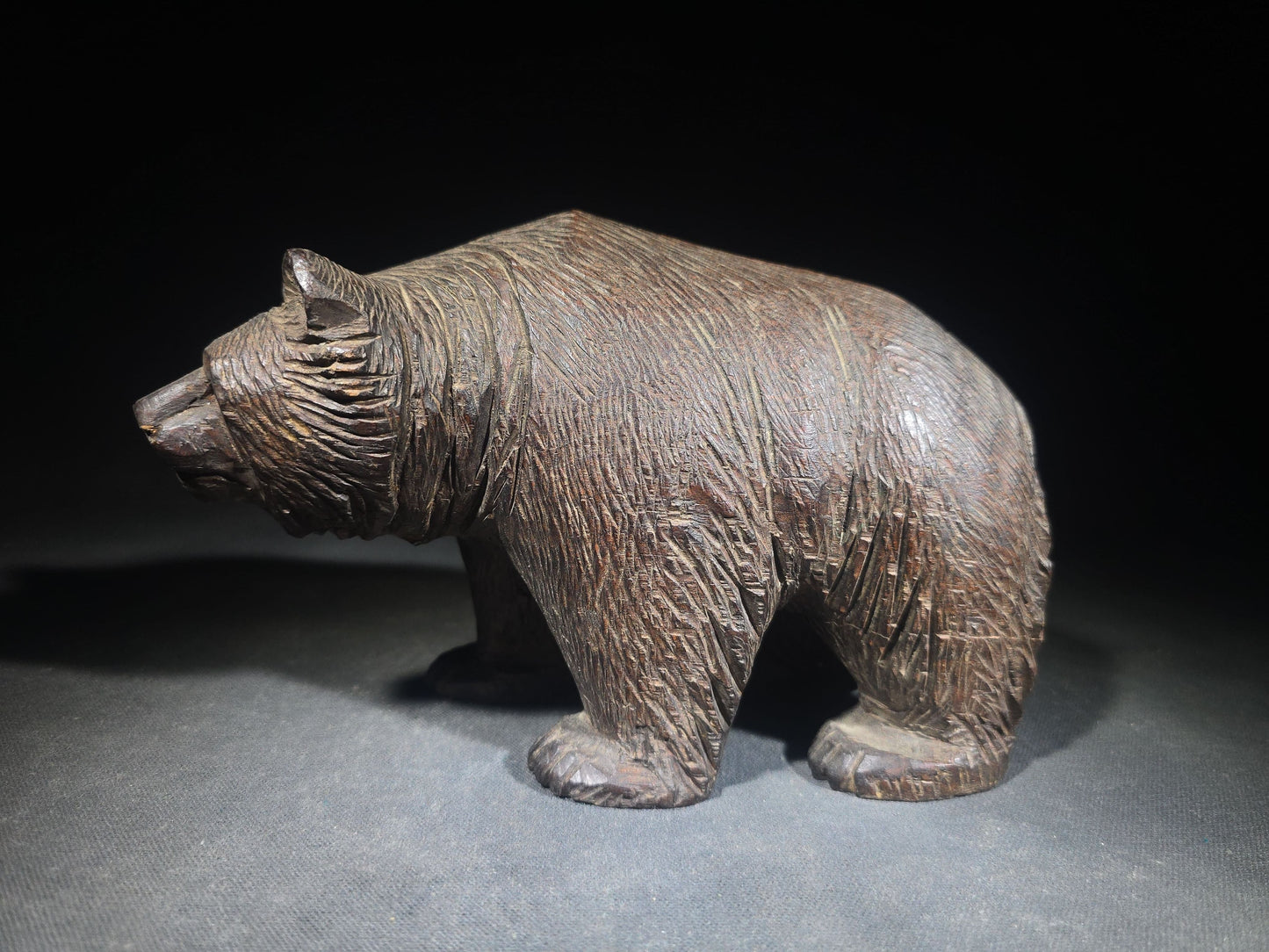 Vintage Carved Wood Bear Figure with Glass Eyes in Walking Pose
