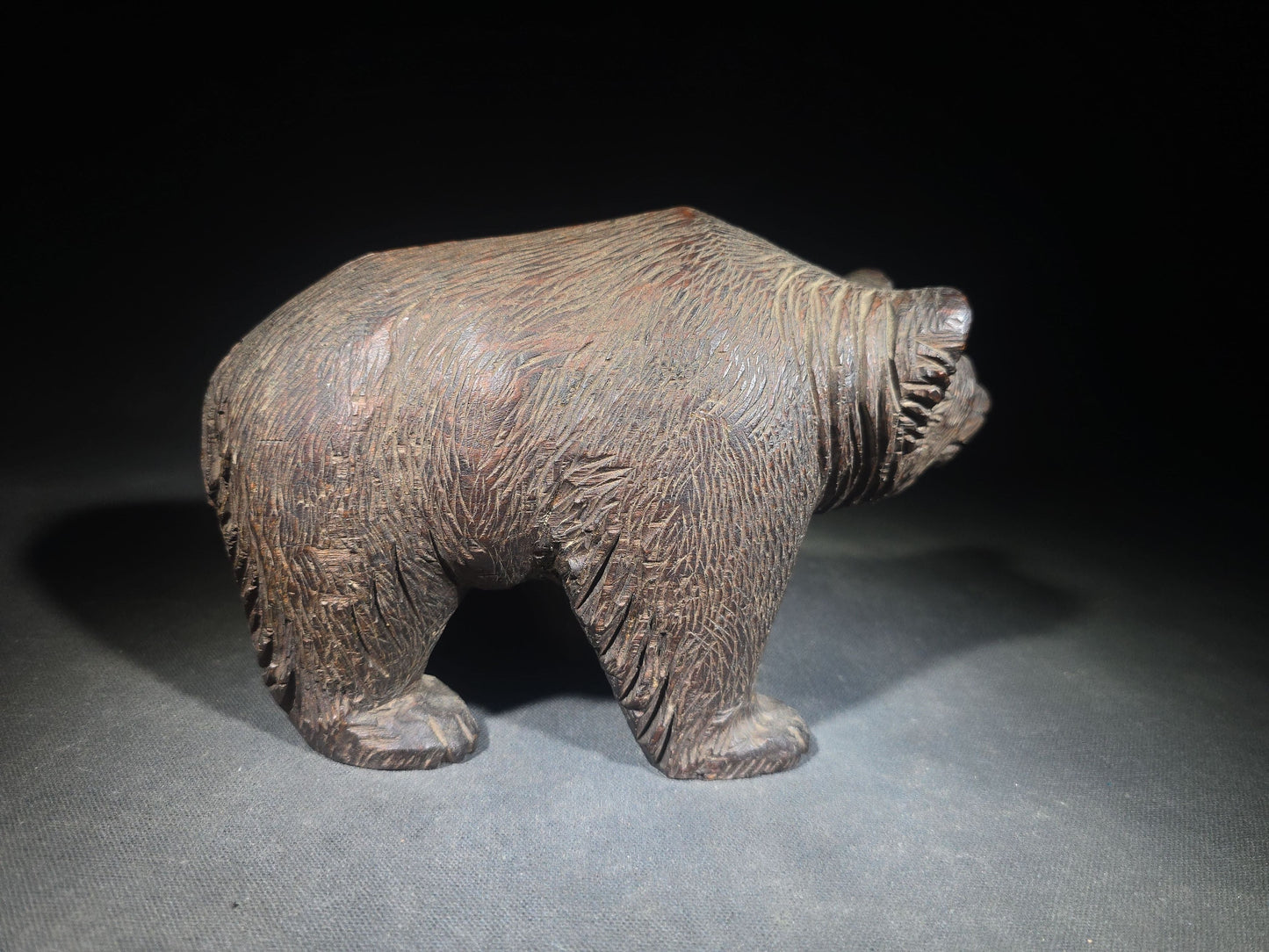 Vintage Carved Wood Bear Figure with Glass Eyes in Walking Pose