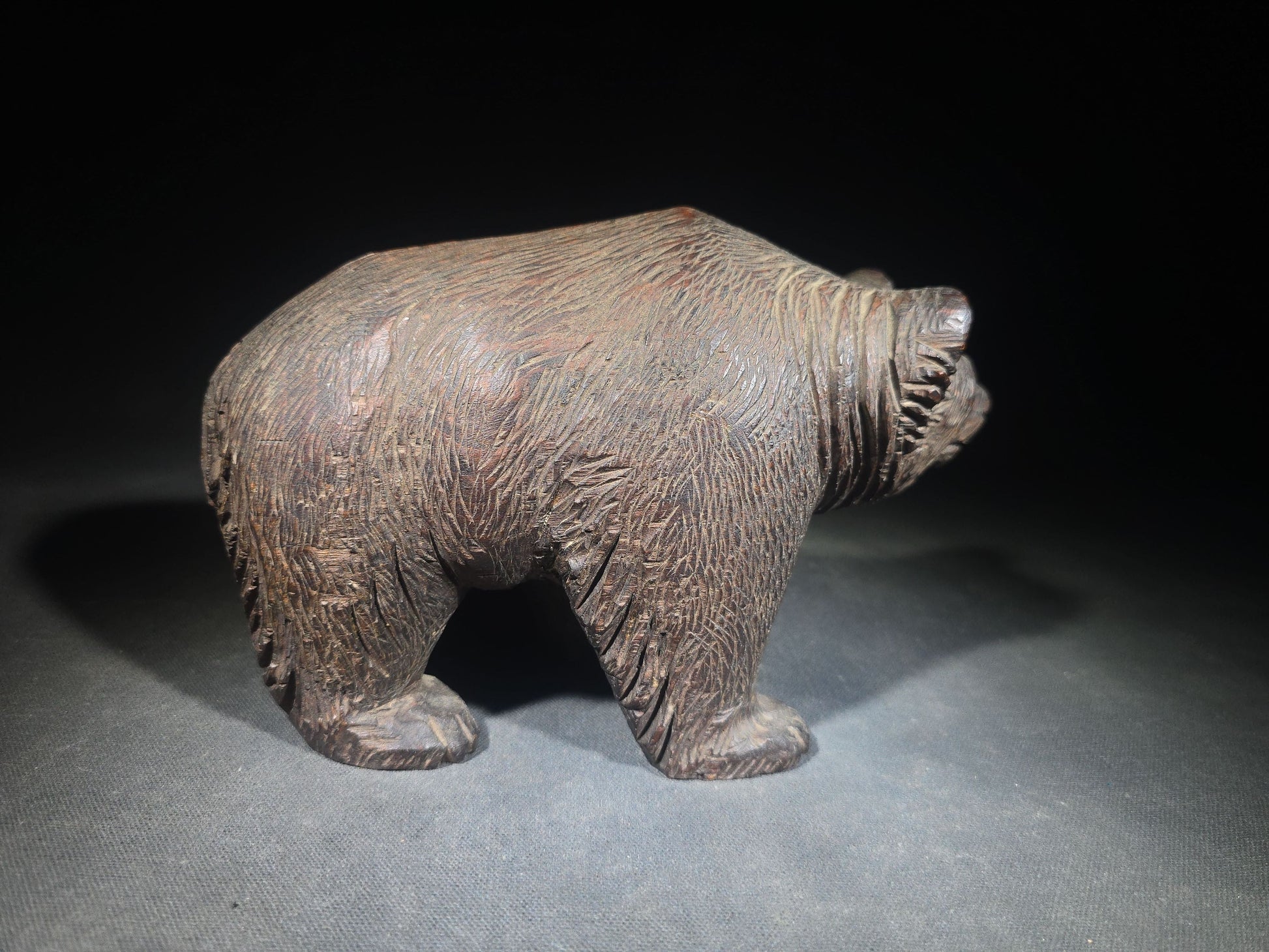 Vintage Carved Wood Bear Figure with Glass Eyes in Walking Pose