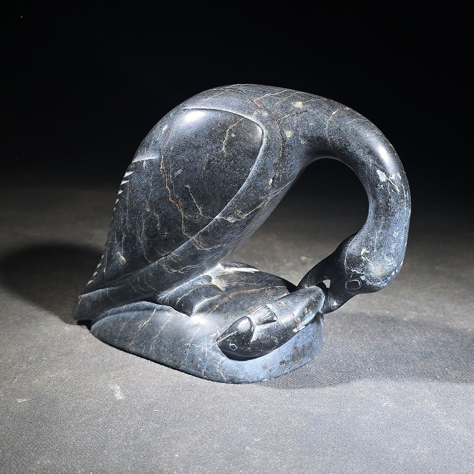 Vintage Inuit Soapstone Carving of a Preening Bird with Inuktitut Syllabics and Igloo Tag
