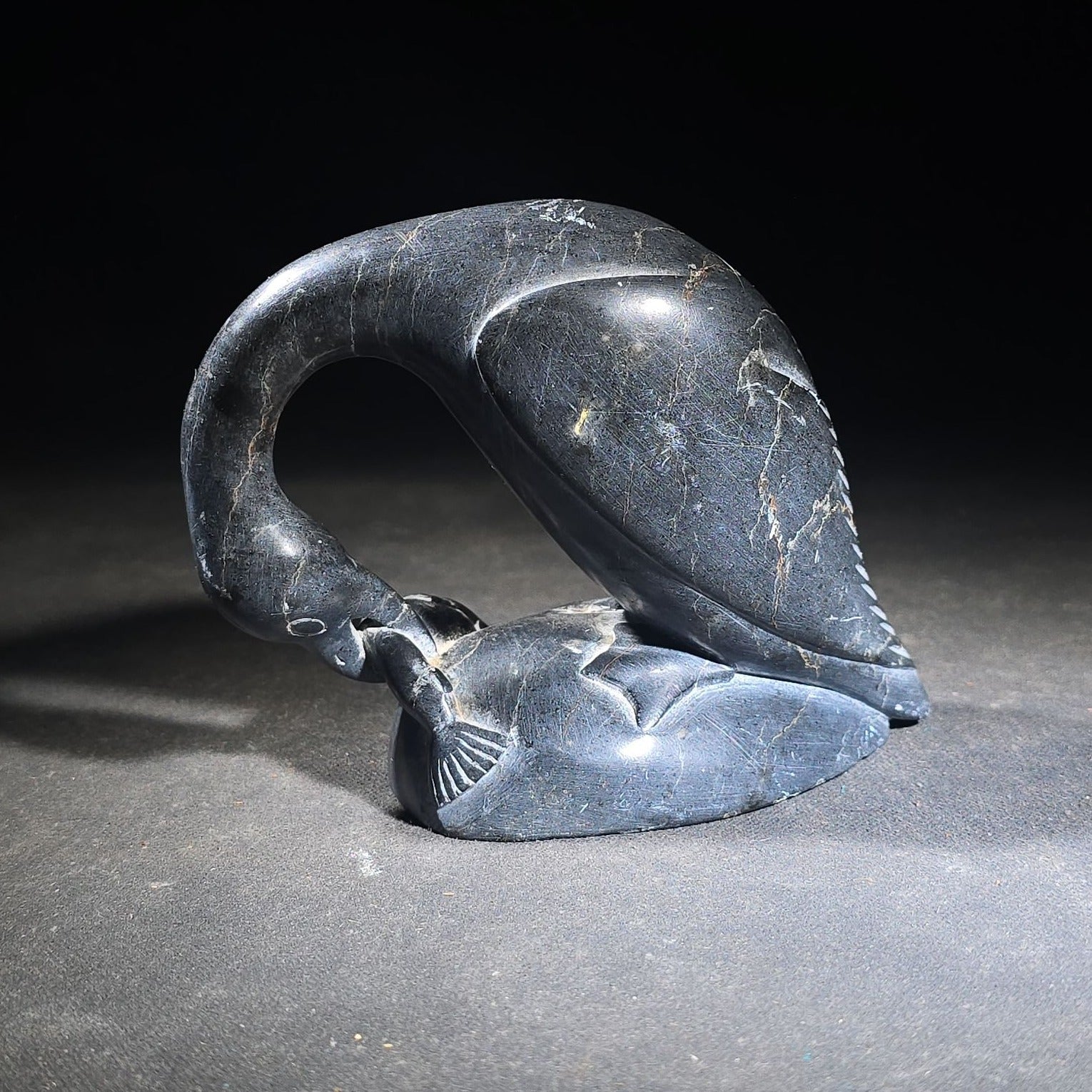 Vintage Inuit Soapstone Carving of a Preening Bird with Inuktitut Syllabics and Igloo Tag