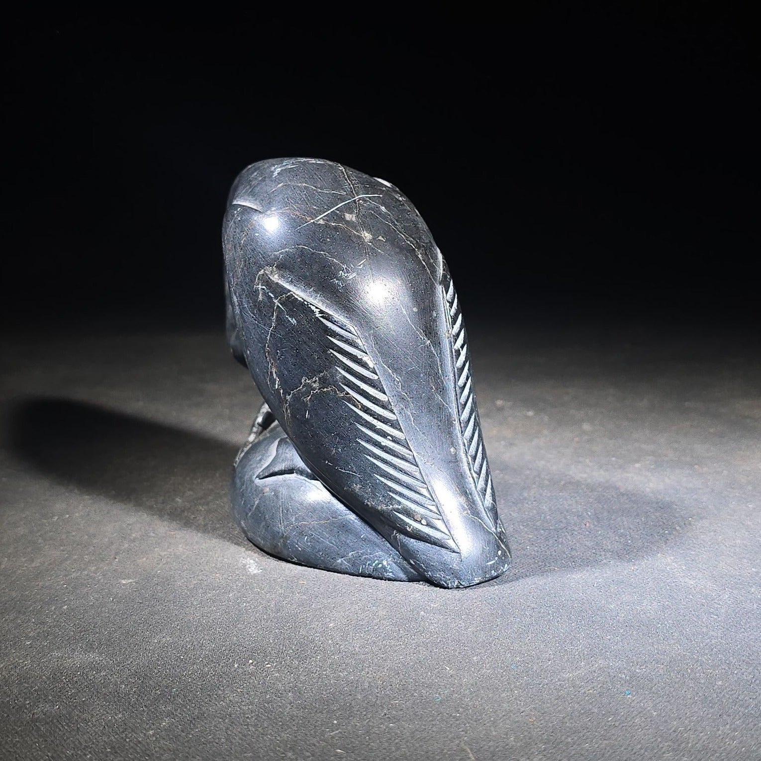 Vintage Inuit Soapstone Carving of a Preening Bird with Inuktitut Syllabics and Igloo Tag