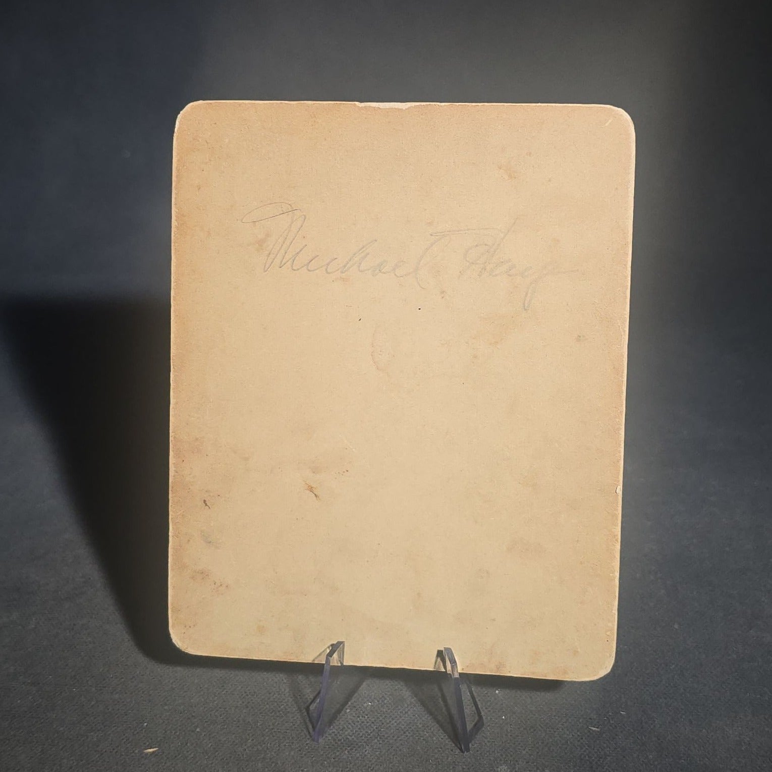 Grouping of Five Antique and Vintage Board-Mounted Photographs including Boy Holding a Box Camera, Two Men in Uniform, Family Eating Watermelon, and Dog Looking Out a Window, One Photographed by Rogers, New Haven, Connecticut