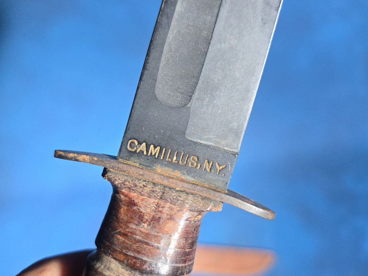 Pair of Vintage WWII U.S.N. Mark 1 Combat Knives with Leather Sheaths, Manufactured by Camillus and Robeson ShurEdge