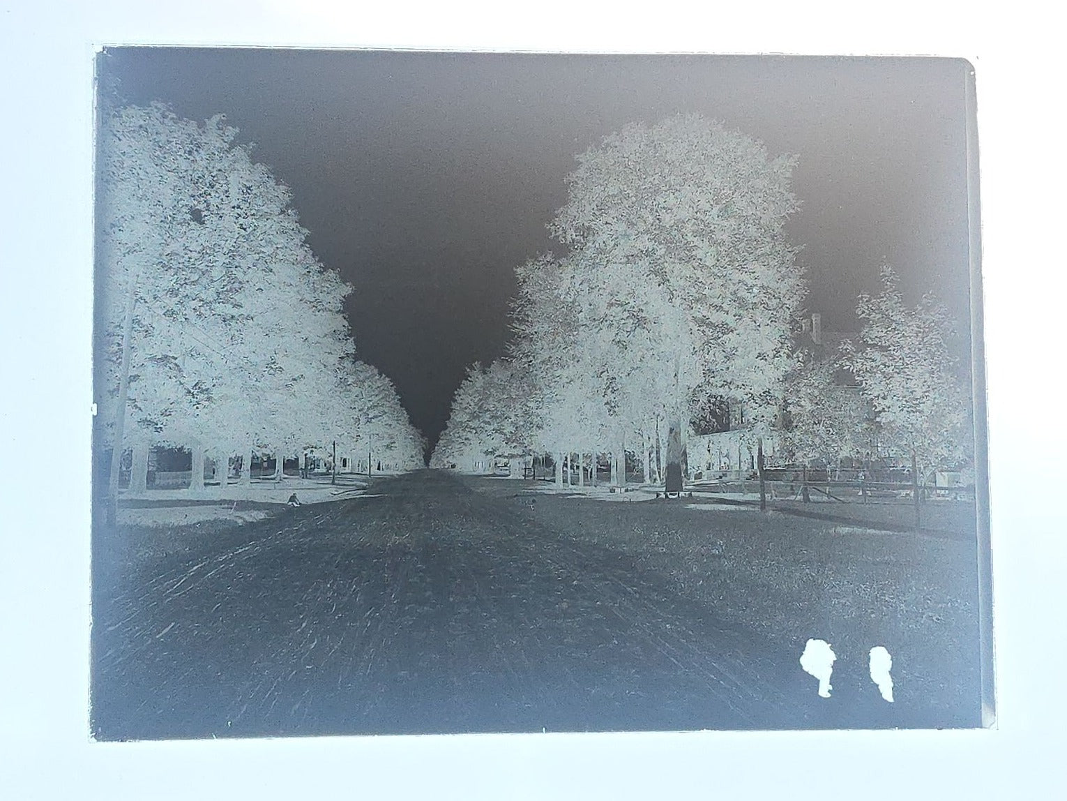 Grouping of 10 Antique Glass Plate Photographic Negatives in Cramer's Lightning Photo Dry Plates Box including Town Street Views, Man with Horse, and Residential Exteriors