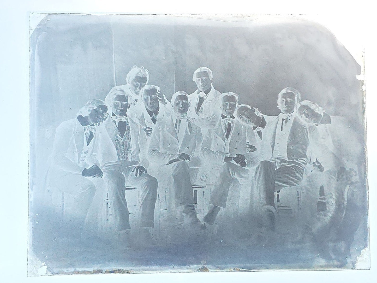Grouping of 10 Antique Glass Plate Photographic Negatives in Cramer's Lightning Photo Dry Plates Box including Town Street Views, Man with Horse, and Residential Exteriors