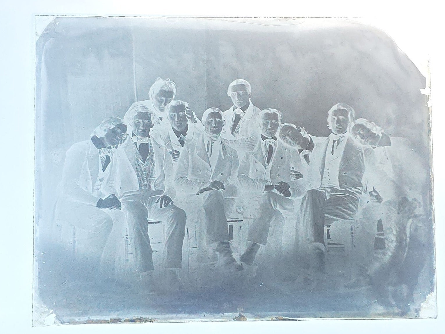 Grouping of 10 Antique Glass Plate Photographic Negatives in Cramer's Lightning Photo Dry Plates Box including Town Street Views, Man with Horse, and Residential Exteriors