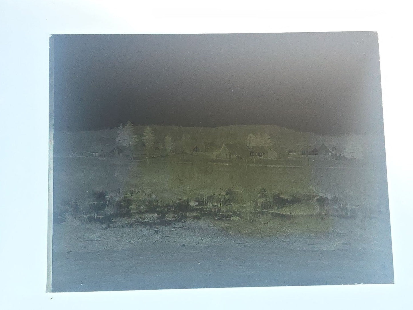 Grouping of 10 Antique Glass Plate Photographic Negatives in Cramer's Lightning Photo Dry Plates Box including Town Street Views, Man with Horse, and Residential Exteriors