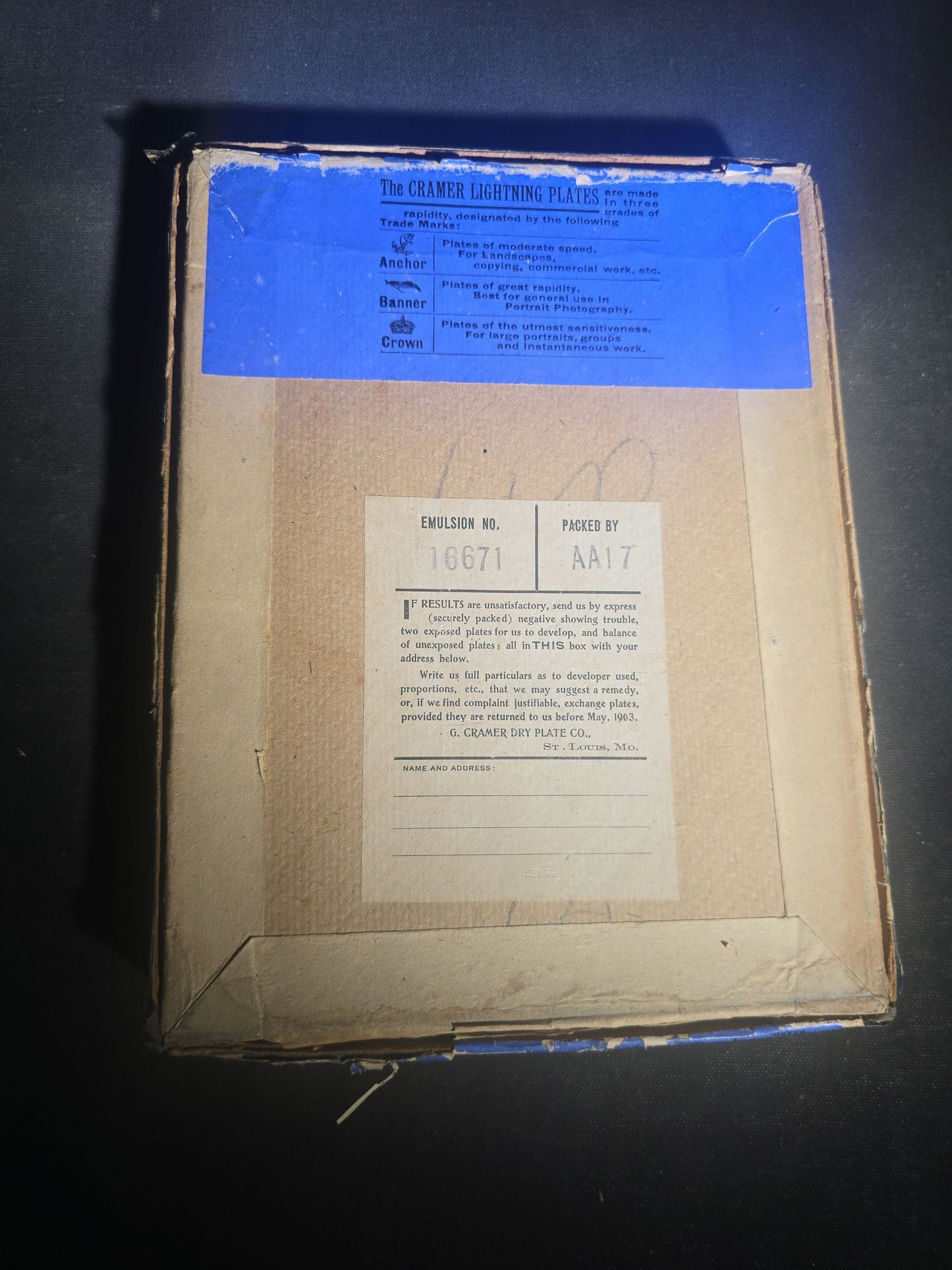 Grouping of 10 Antique Glass Plate Photographic Negatives in Cramer's Lightning Photo Dry Plates Box including Town Street Views, Man with Horse, and Residential Exteriors