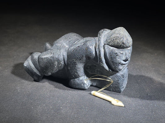 Vintage Inuit Soapstone Carving of a Prone Hunter with Bone Spear, Signed J. Muckpa, Note Spear Broken