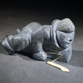 Lot 107 - Vintage Inuit Soapstone Carving of a Prone Hunter with Bone Spear, Signed J. Muckpa, Note Spear Broken, 2-1/2" H