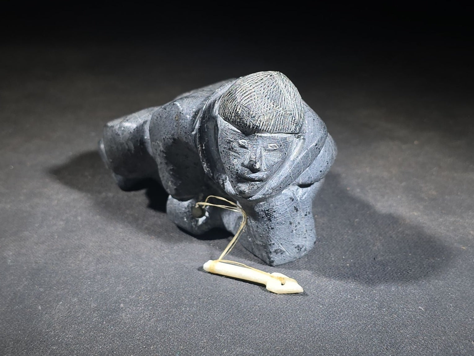 Vintage Inuit Soapstone Carving of a Prone Hunter with Bone Spear, Signed J. Muckpa, Note Spear Broken