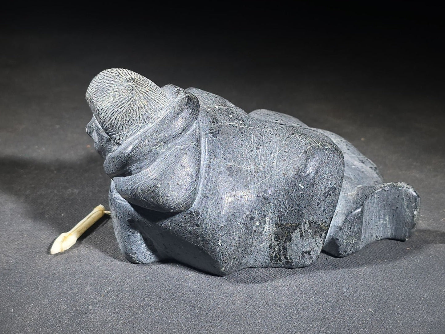 Vintage Inuit Soapstone Carving of a Prone Hunter with Bone Spear, Signed J. Muckpa, Note Spear Broken