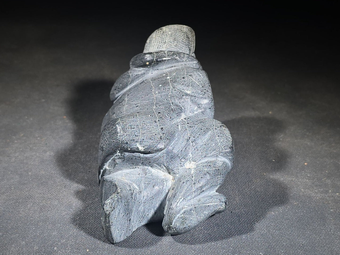 Vintage Inuit Soapstone Carving of a Prone Hunter with Bone Spear, Signed J. Muckpa, Note Spear Broken