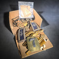 Lot 049 - Grouping of Antique U.S. Navy Officer Uniform Remnants and Veteran Organization Medals Including Shoulder Boards, Scoville Buttons, G.A.R. 32nd National Encampment 1898 Souvenir Badge, and Naval Veterans Boston 1904 Convention Medal