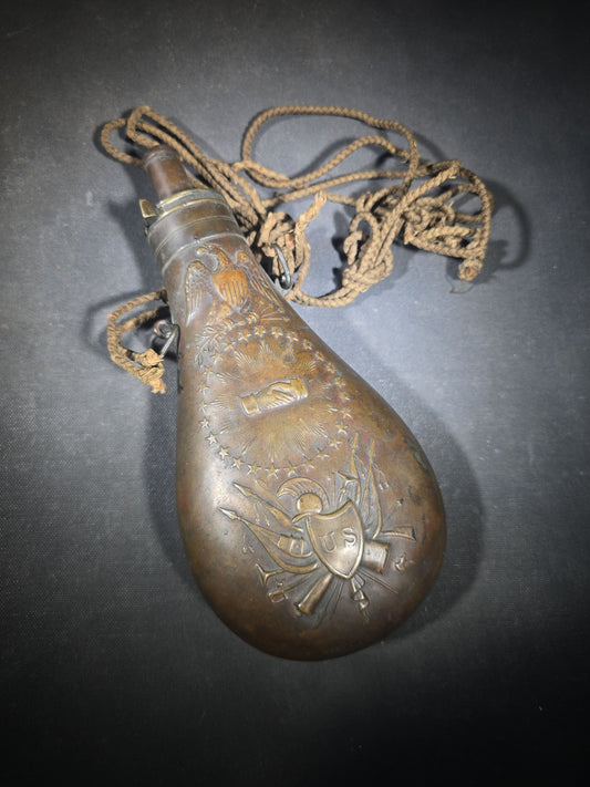 Antique N.P. Ames "Peace" Pattern Brass Powder Flask with Eagle, Clasped Hands, Stars, and "US" Shield with Military Trophy, Dated 1838, Springfield, Massachusetts, with Braided Cord Carry Strap