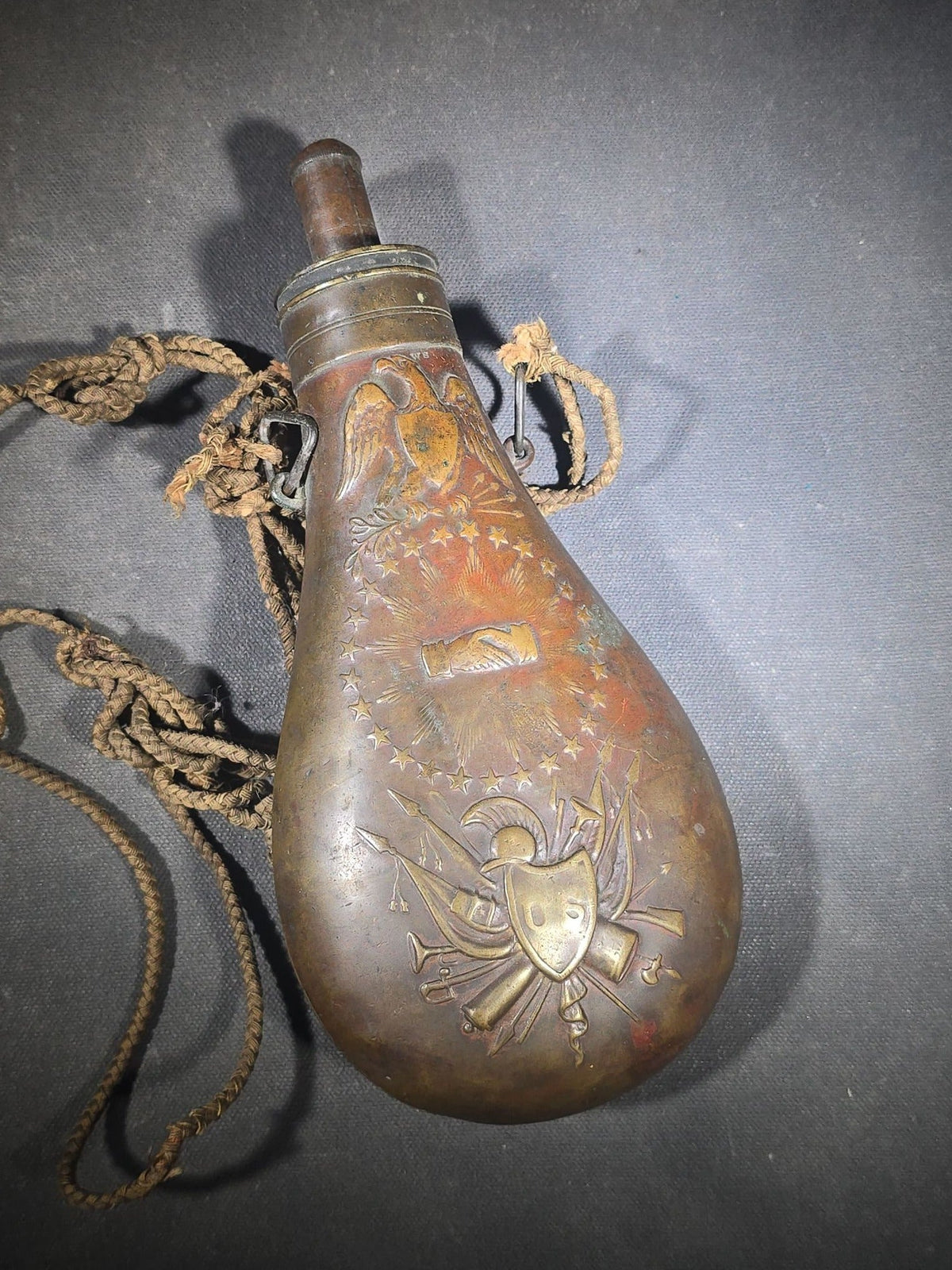Antique N.P. Ames "Peace" Pattern Brass Powder Flask with Eagle, Clasped Hands, Stars, and "US" Shield with Military Trophy, Dated 1838, Springfield, Massachusetts, with Braided Cord Carry Strap