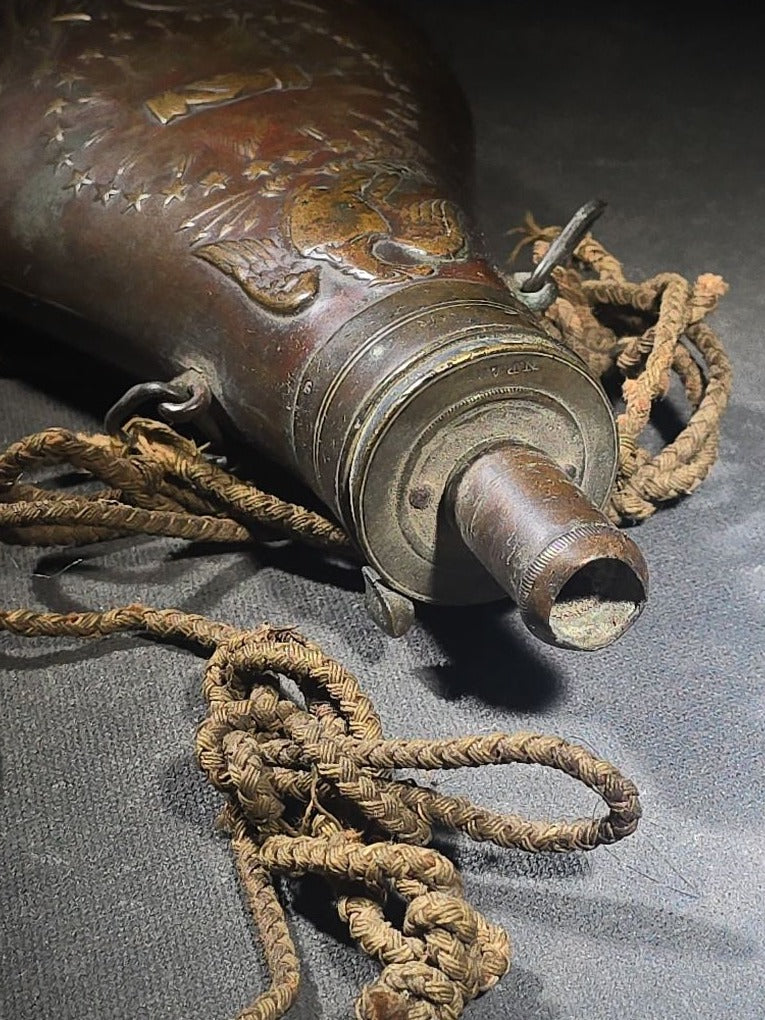 Antique N.P. Ames "Peace" Pattern Brass Powder Flask with Eagle, Clasped Hands, Stars, and "US" Shield with Military Trophy, Dated 1838, Springfield, Massachusetts, with Braided Cord Carry Strap